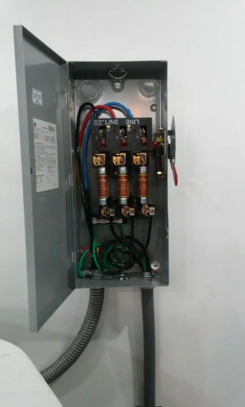 Three-phase disconnect switch installed for Smoke Detector Installation in College Station